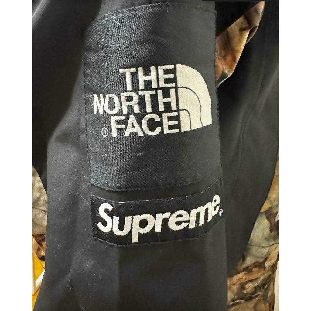 North Face x Supreme men's camo jacket